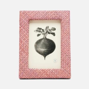 A woven pink frame displays a black-and-white illustration of a turnip with green leaves.