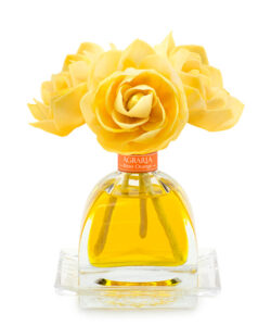 A clear glass bottle holds yellow rose-shaped flowers and yellow liquid, labeled "Agraria Bitter Orange.