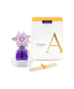 Lavender and rosemary fragrance bottle with a flower cap, next to a box and reed sticks.