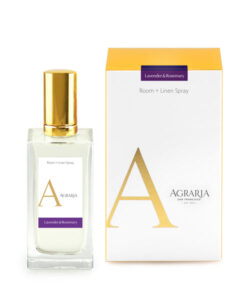 A bottle of lavender and rosemary room spray next to its packaging.