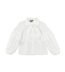 White blouse with a bow tie, ruffled layers, and puffed sleeves.