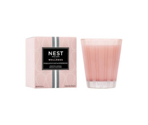 A pink scented candle next to its decorative box, labeled "Himalayan Salt & Rosewater.