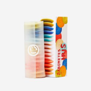 Colorful soap bars arranged in a stack beside a decorative box labeled "Sabonetes Iris.