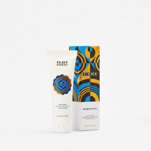 Hand cream tube and box featuring colorful geometric designs and branding.