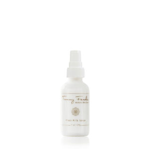 White spray bottle of Tammy Fender Plant Milk Serum, labeled with product details.