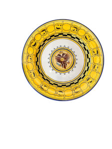 Decorative plate featuring a central eagle emblem, surrounded by a yellow and black patterned border.