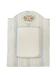 Large blue-striped picture frame with a floral design featuring pink roses at the top.