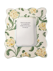 Decorative medium picture frame with yellow flowers and green leaves, featuring a back slit for photo insertion.