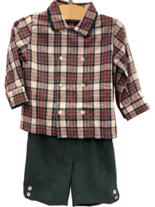 Plaid shirt with double buttons and green corduroy shorts displayed on a hanger.