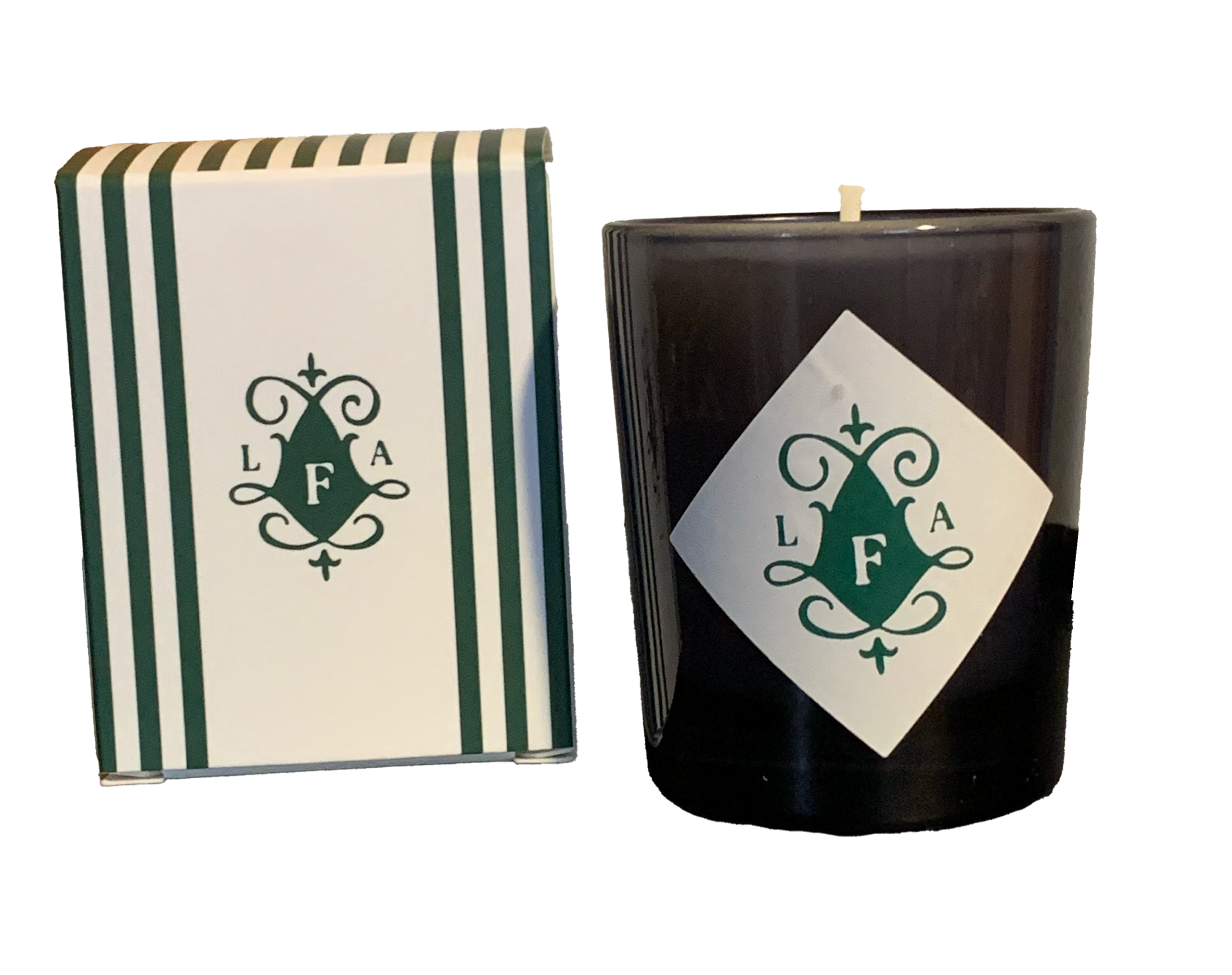 Leta Austin Foster Tuberose Candle A dark candle with a decorative label, next to a striped box featuring the initials "LFA.