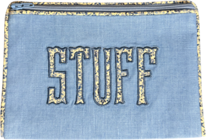 Blue pouch with "STUFF" embroidered in decorative lettering. Zippered closure at the top.