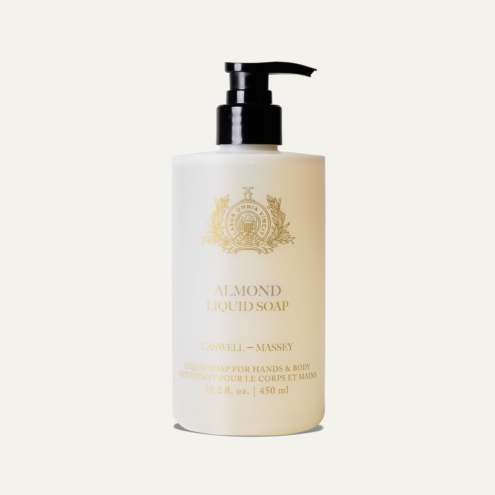 Clear bottle of almond liquid soap with a pump dispenser, labeled for hands and body use.