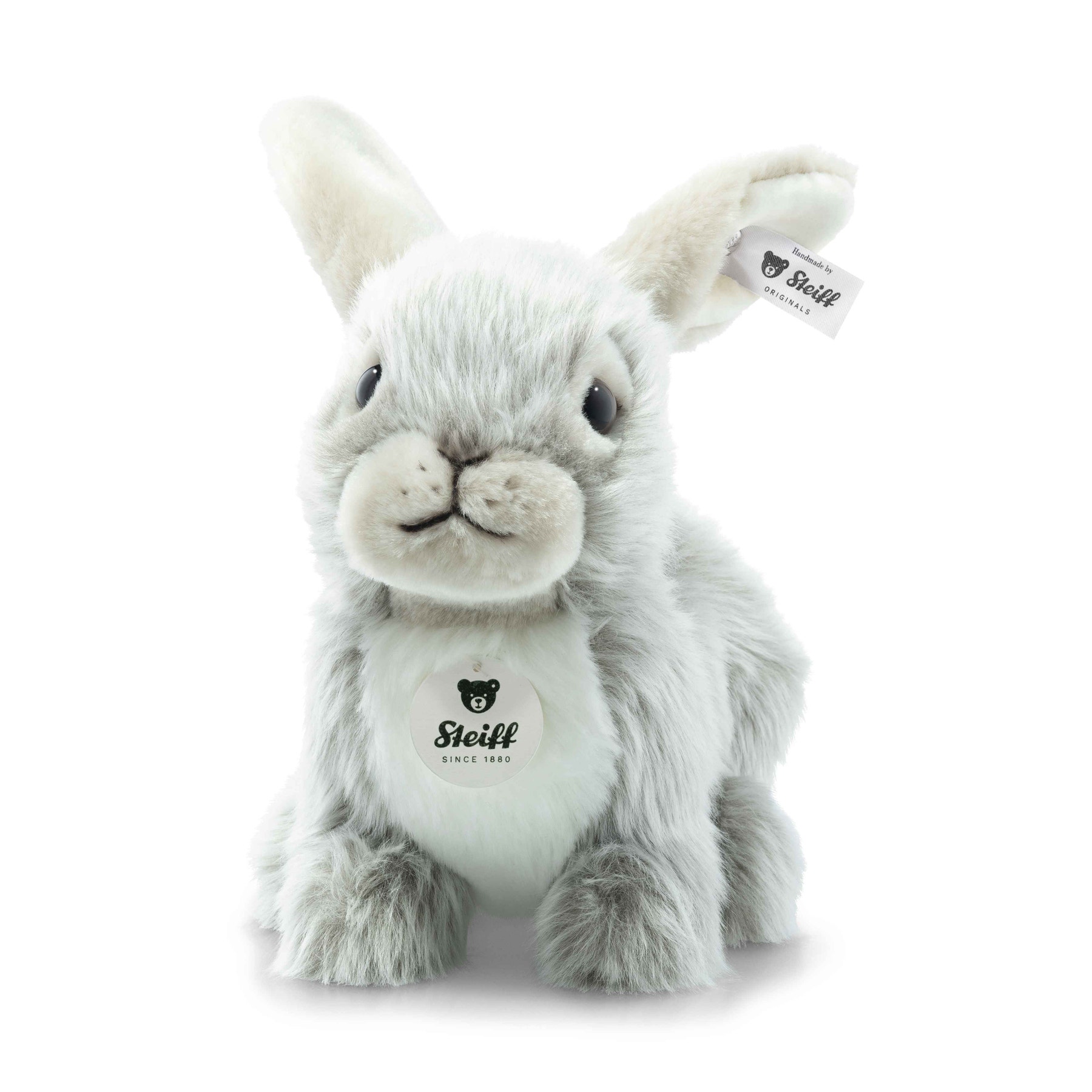 A gray plush rabbit with soft fur and a tag from Steiff, sitting upright.