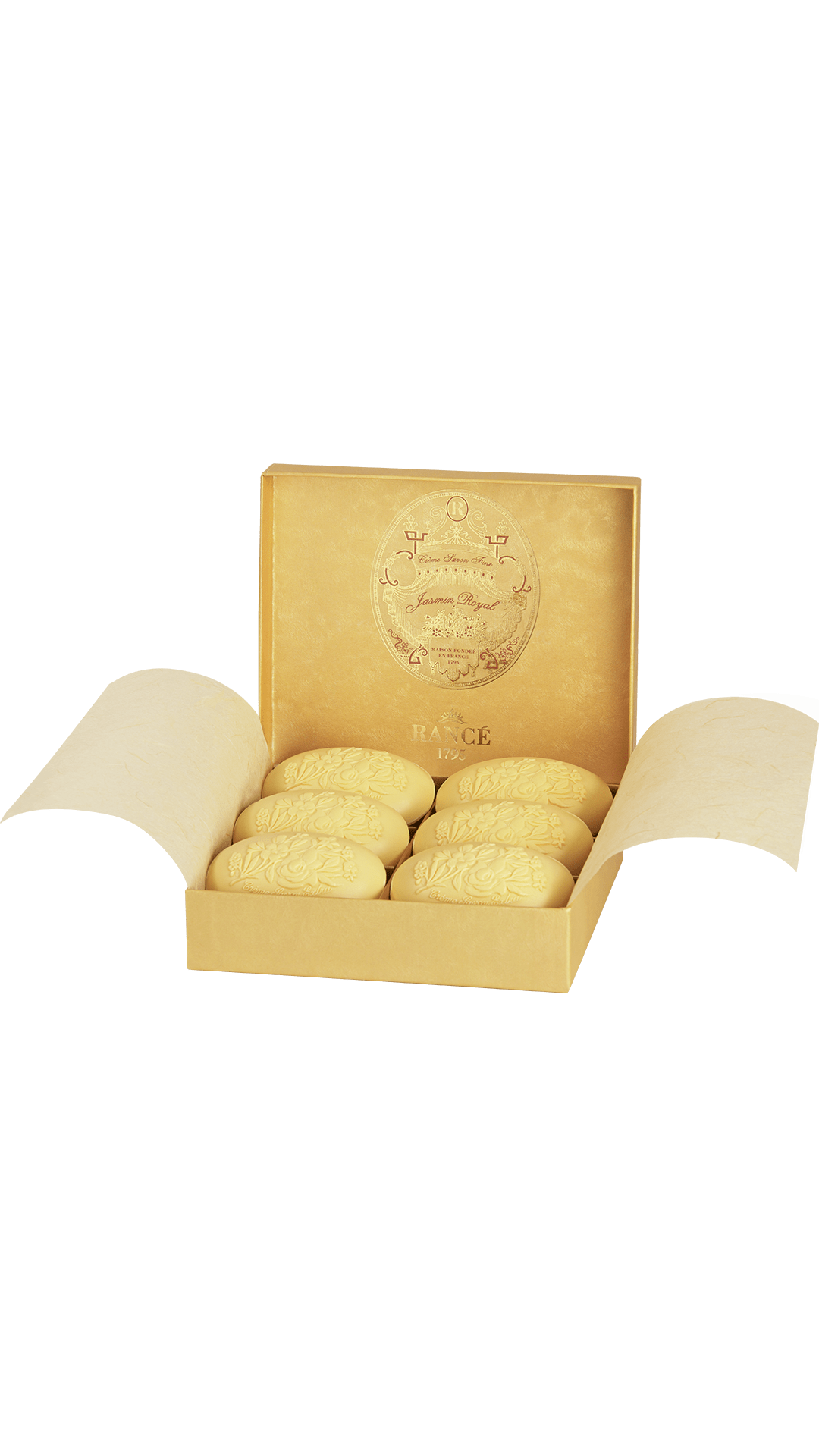 A gold box containing six oval soaps, labeled "Jasmin Royal," with floral designs.